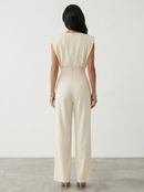 Aria | Mono con cintura elegante
